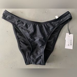 Brand new with tags size Medium black high cut bikini bottom animal print